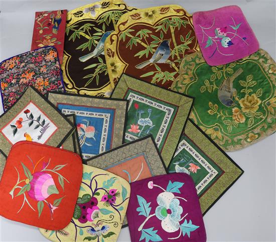 A collection of Chinese embroidered silk panels and mats